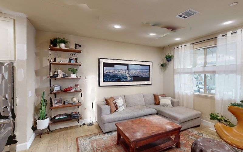 Eye-level view inside a furnished living room captured with a Matterport Pro3